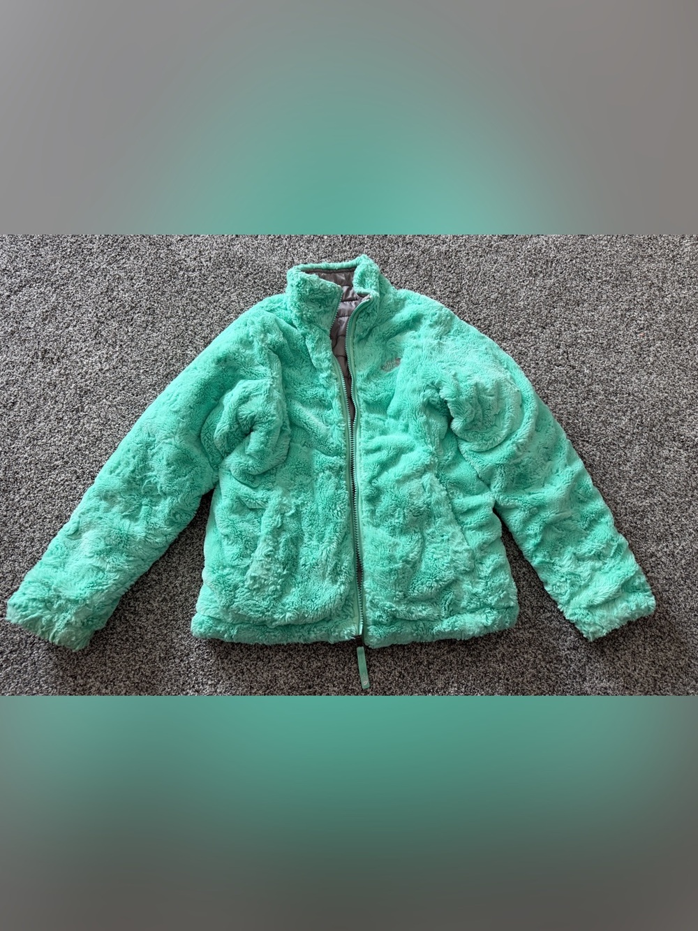 The North Face reversible jacket in size M 10/12. Teal & gray polyester & nylon